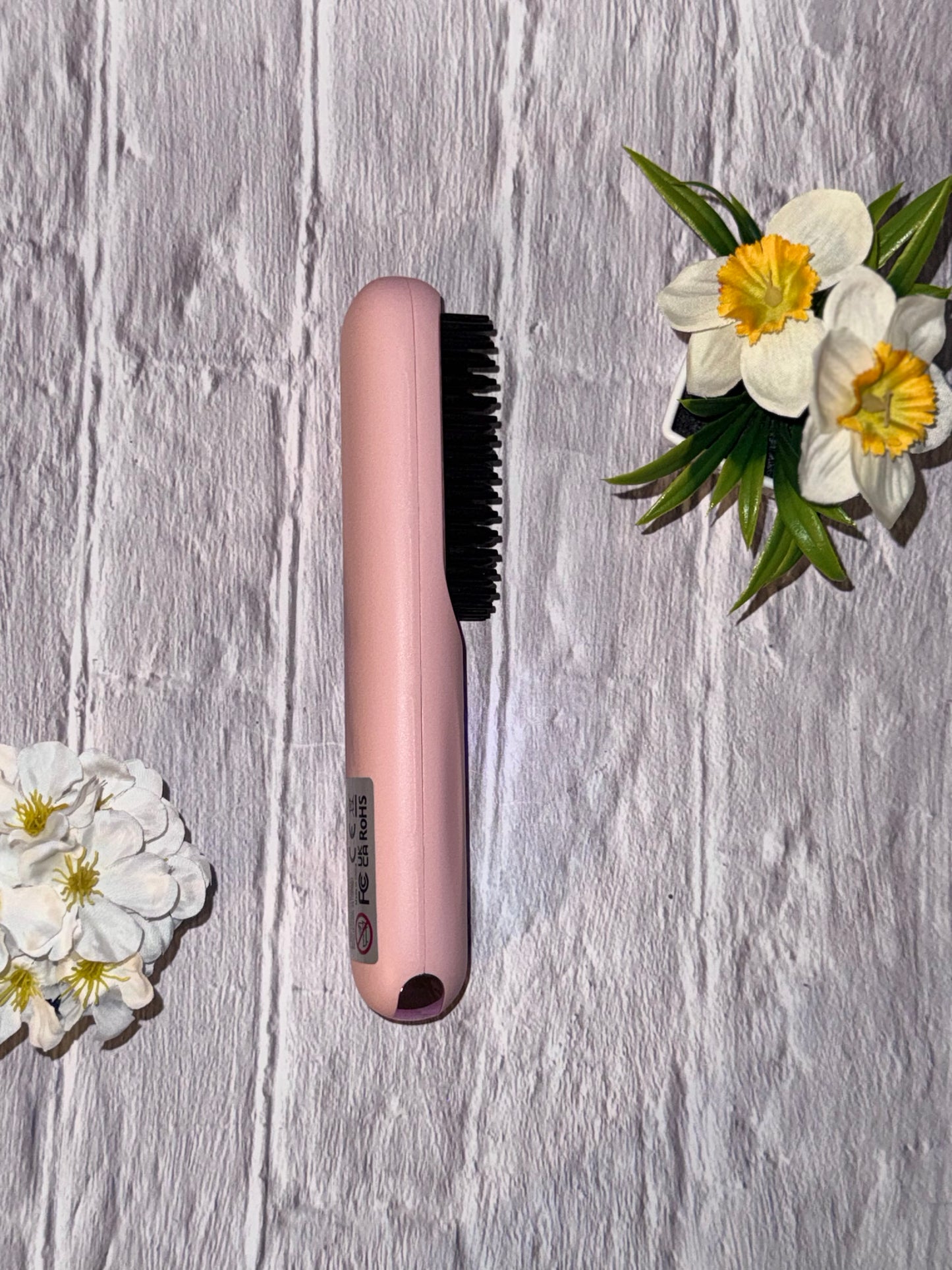 Portable wireless hair comb